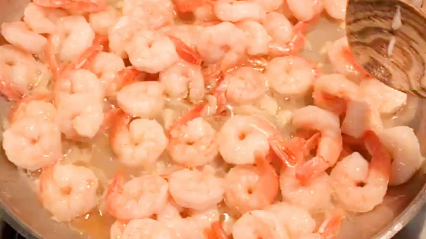 Cook the shrimp in sesame oil and with the garlic for about 2 minutes (you may need to remove the water if the shrimp releases too much of it)