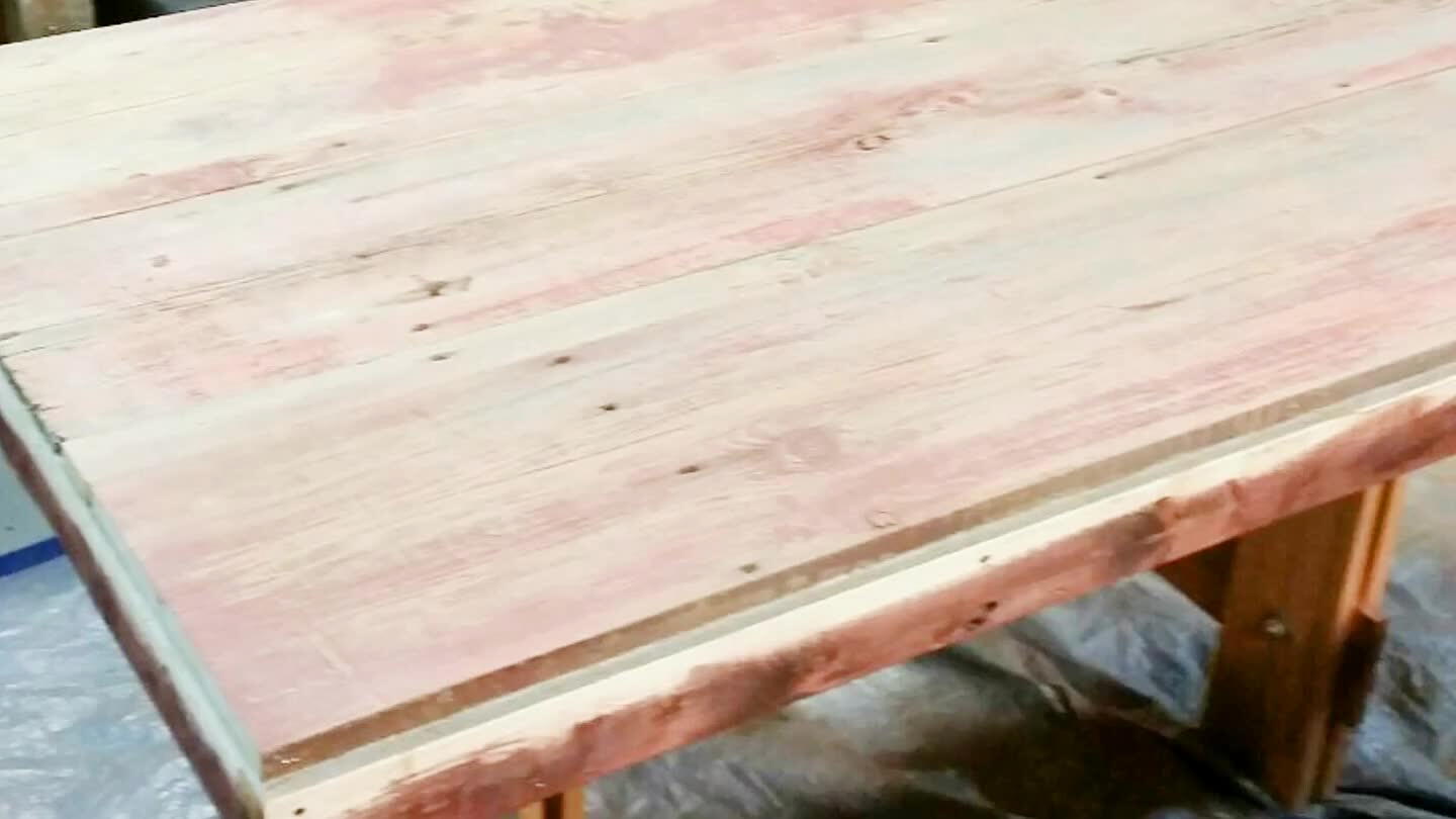 Cut and layout reclaimed wood onto plywood base. Used glue and Brad nails to secure wood