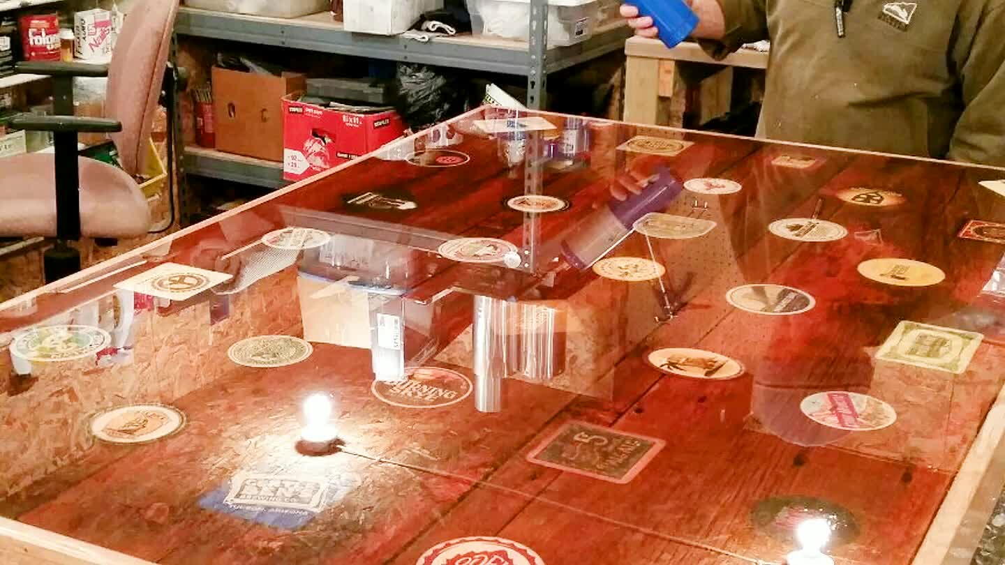 Mix a gallon epoxy and flood fill table. Use propane torch to degas airbubbles. Dry 72 hours.
