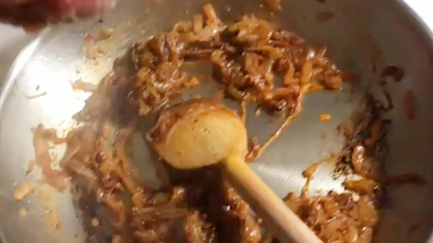 Water's mostly gone, we can add the ground turkey now. The pan should be pretty hot here. Season it up with a little salt and you're good to go.