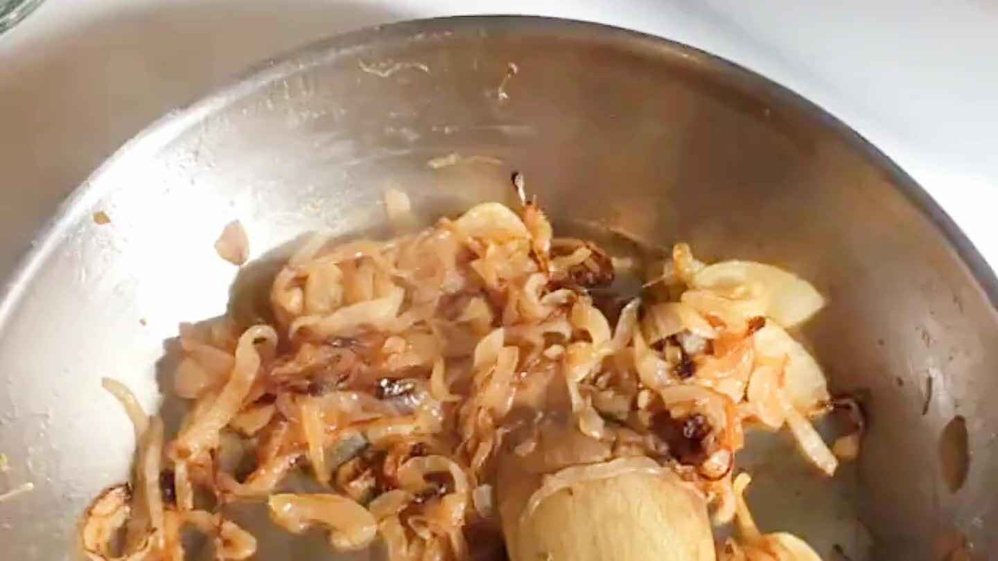it. Let them cook gently for a few minutes. Then add the water and a splash of vinegar for some good ole tang. Let that reduce.