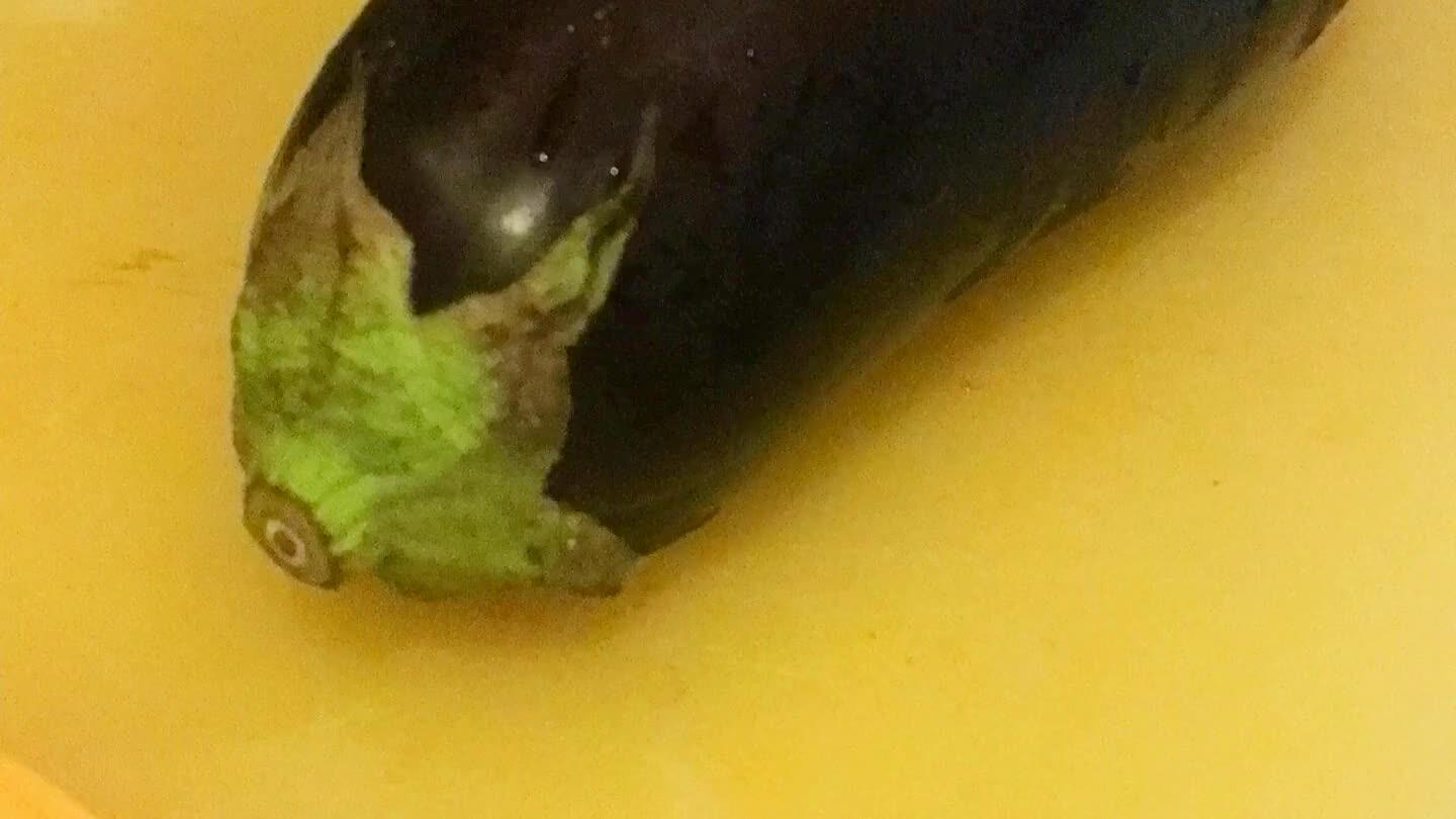Dice eggplant. Toss with olive oil. Bake for about 15 minutes.