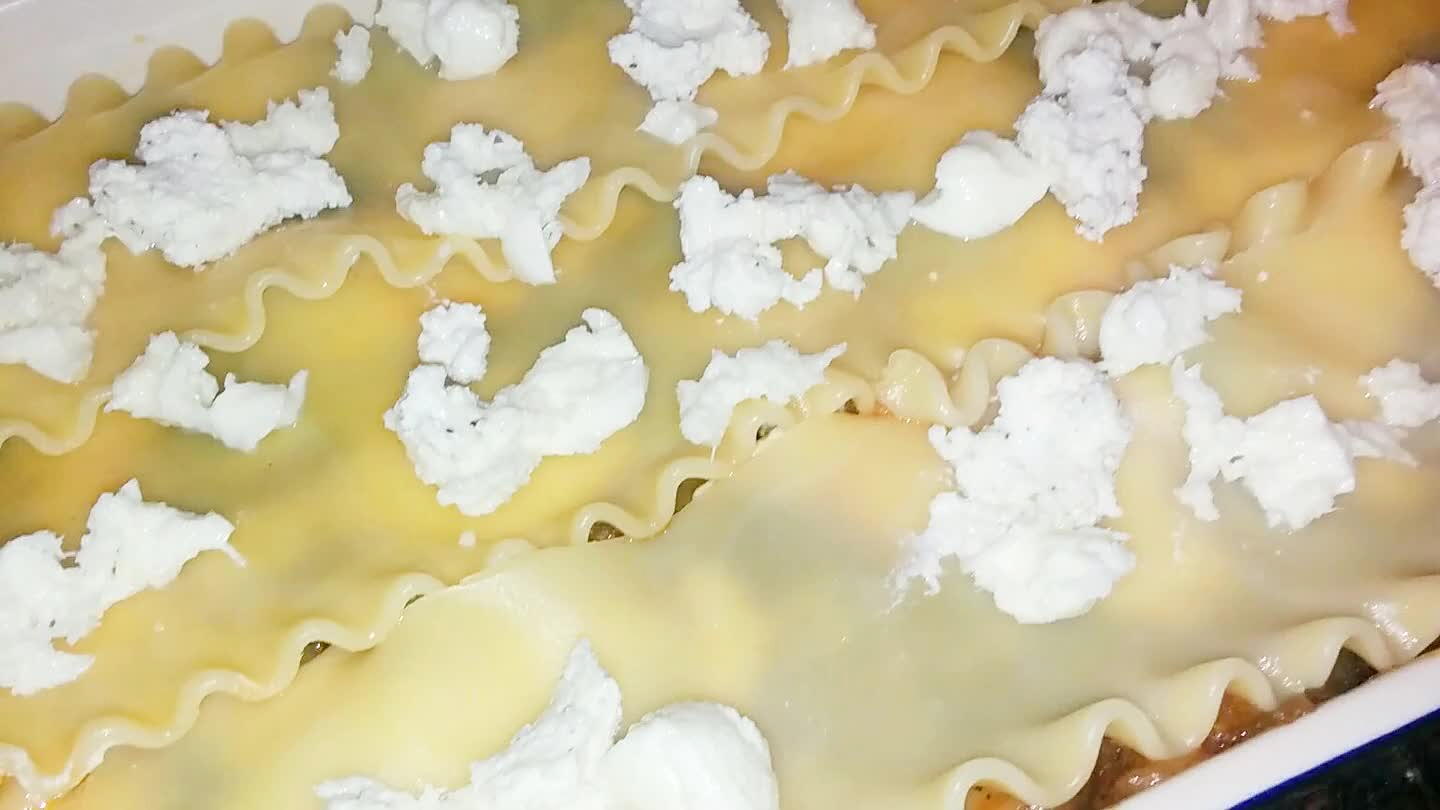 Now repeat. More noodle, more sauce, more cheese. Finish with a little cheese and the last of your sauce to keep the top moist.