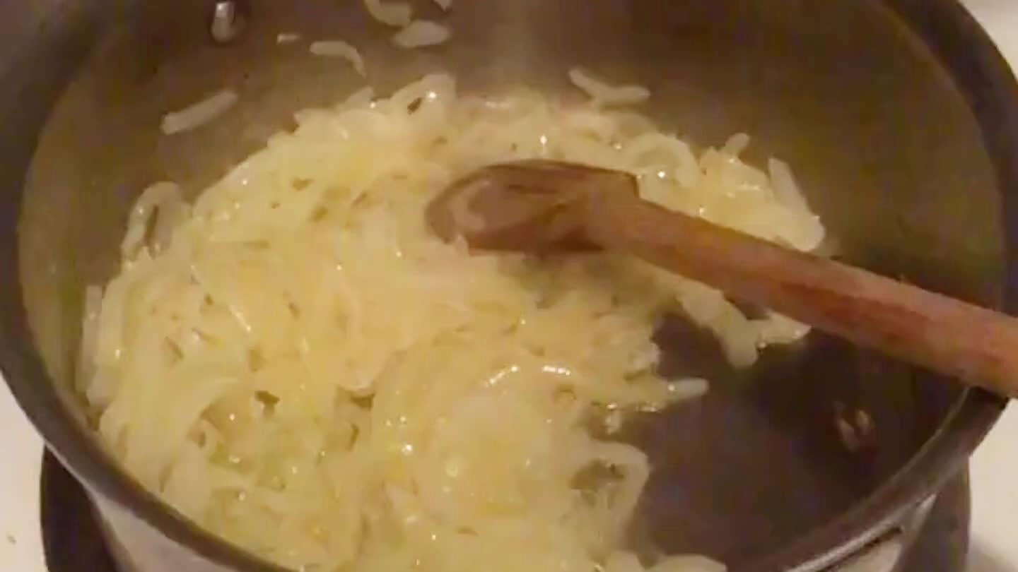 When the onions are tender, clean and slice your mushrooms and add to the pot.