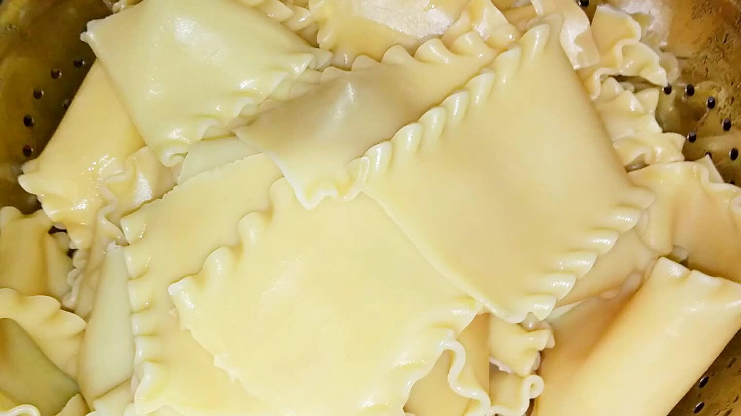 Bring a big pot of salted water to a boil. Cook your noodles as directed on the package. You want them al dente though because you're gonna bake the lasagna later.