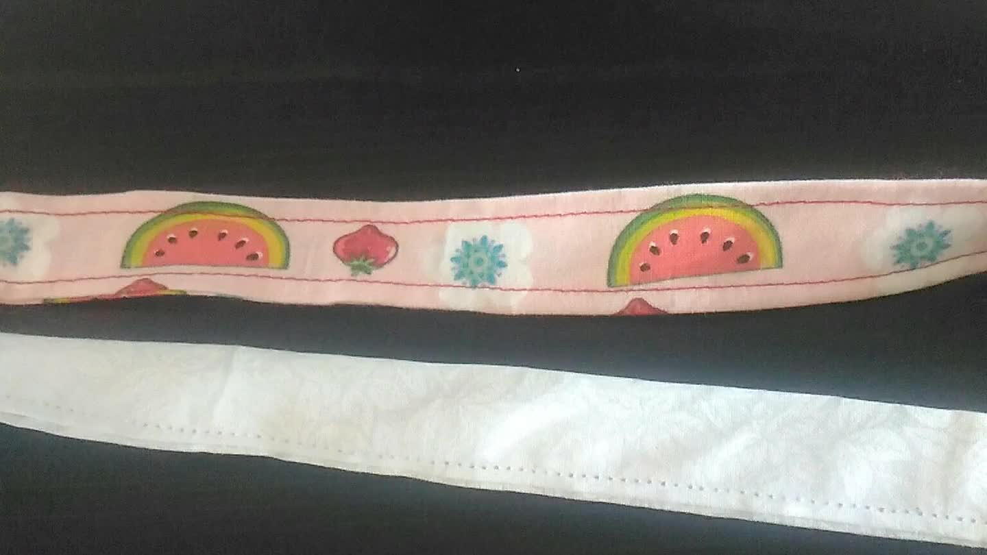 faixa na cabeça e na cinto coloque botões (encape os botões como foi feito na boneca)