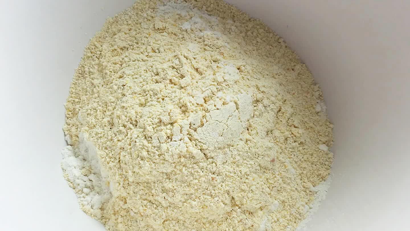 Combine remaining ingredients in a separate bowl, then mix them into the wet ingredients with a spatula. You don't wanna overmix, but you do want to break up the lumps.