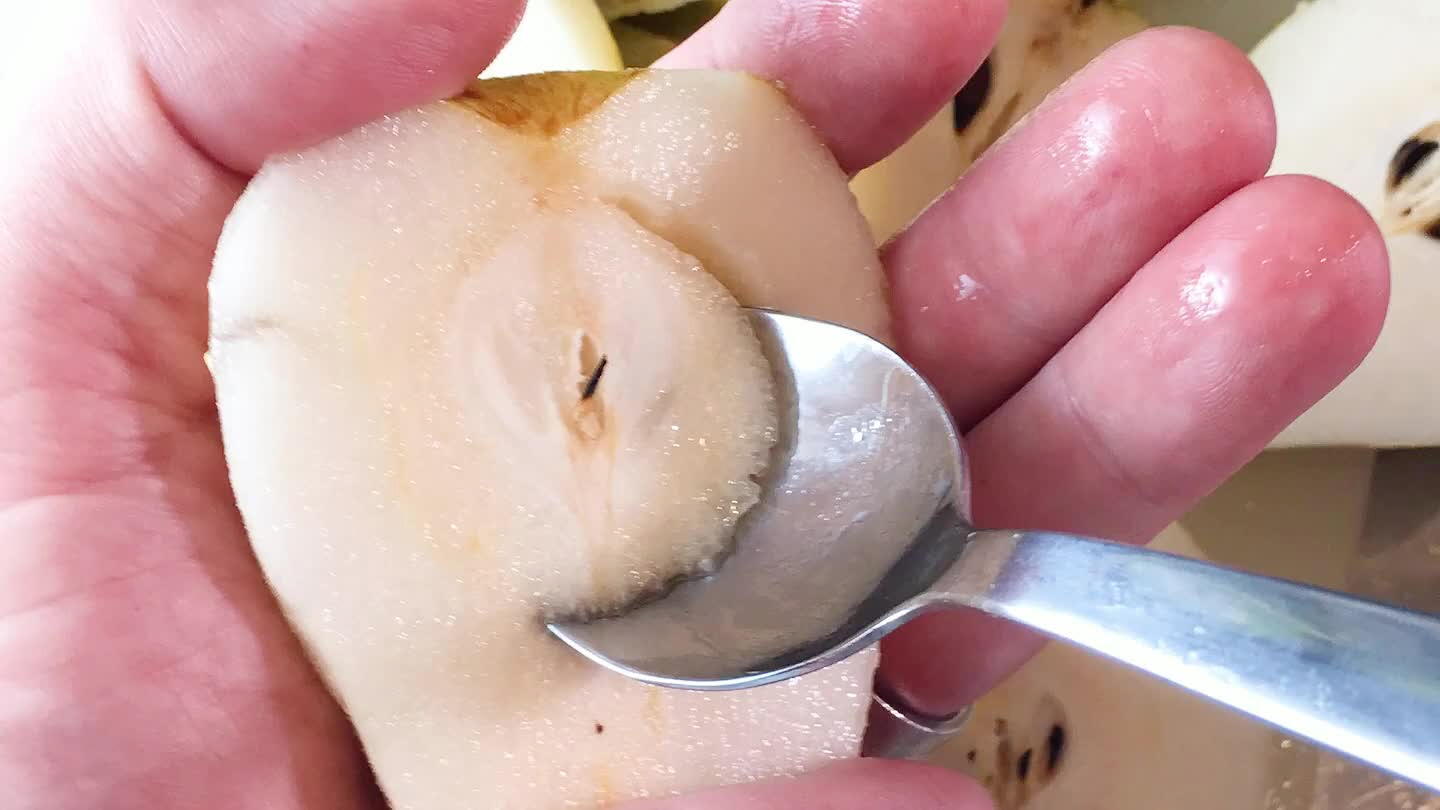 Remove the seed core with a small spoon. Slice out the stem.