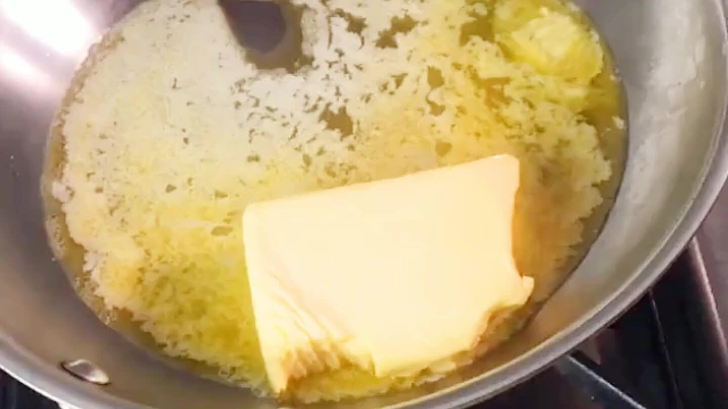 Melt the butter and whisk half of it into the egg mixture.