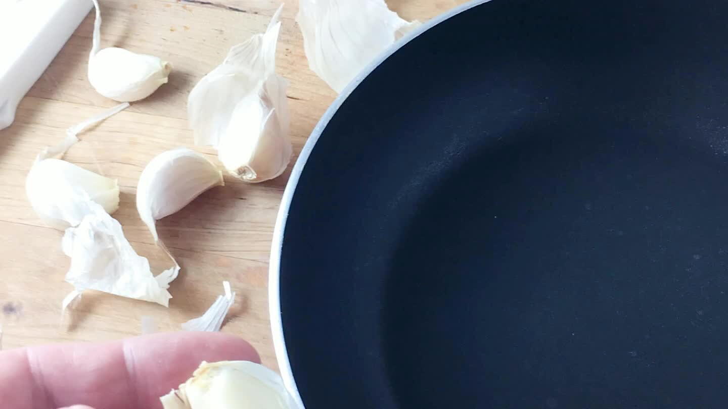 Peel and slice the garlic. You want it really thin and even. I have a little fine microplane that works great.