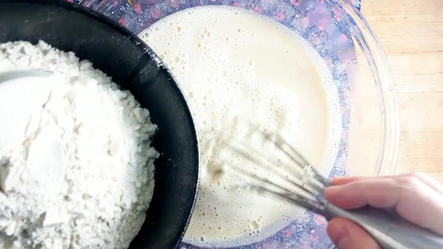 Whisk in the sugar. Stir in the flour until fully mixed.