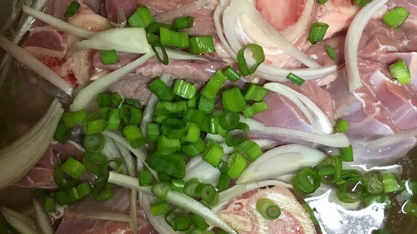 en pour white wine (as much as to cover the meat.) let it sit for about 15-20 min.