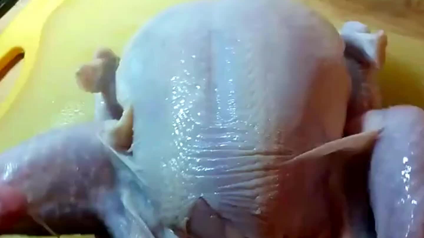 hen flip the chicken over, pulling the leg back until the hip joint pops.