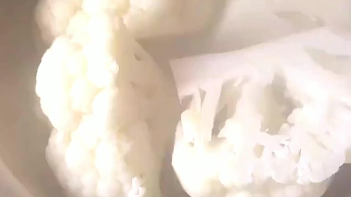 Move the cauliflower to a blender. Reserve the cooking liquid.