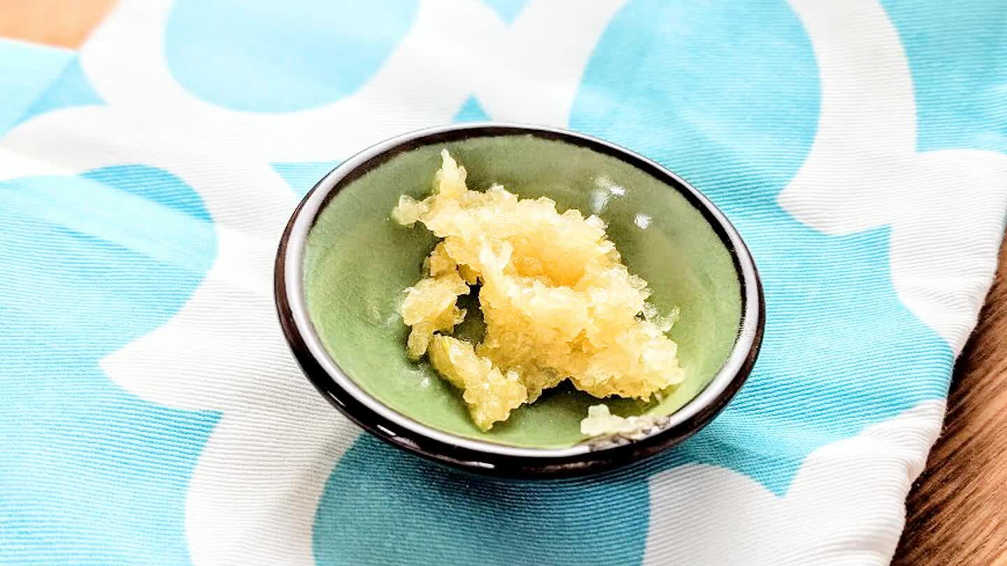 Crush up the 4 cloves of garlic however you like. If you're looking for a good technique, check out the attached recipe