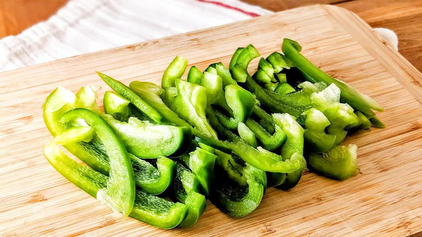 Similarly, slice the bell pepper to something like a wide julienne.