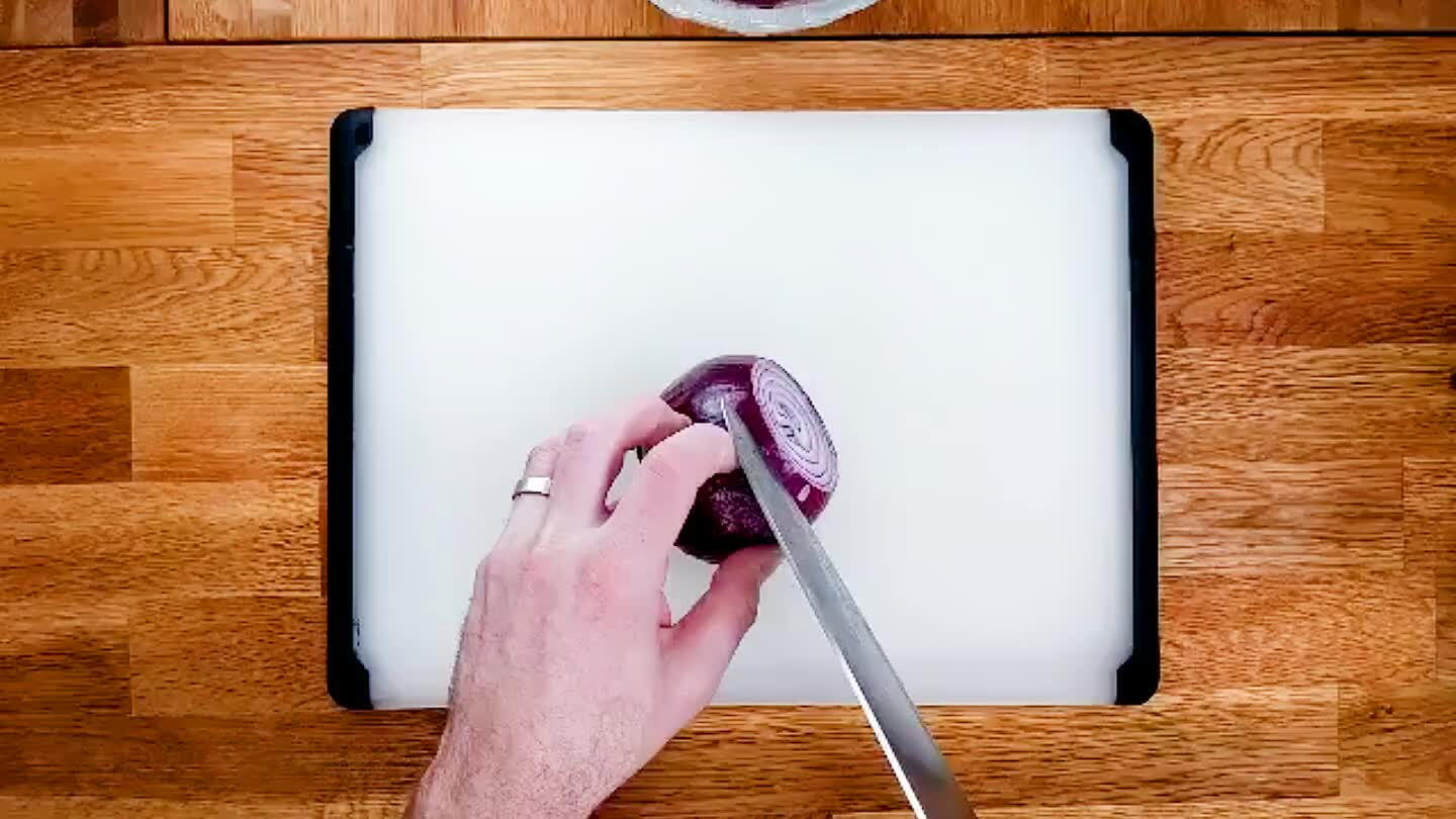 Remove the top of the onions. Peel. Slice into rings.