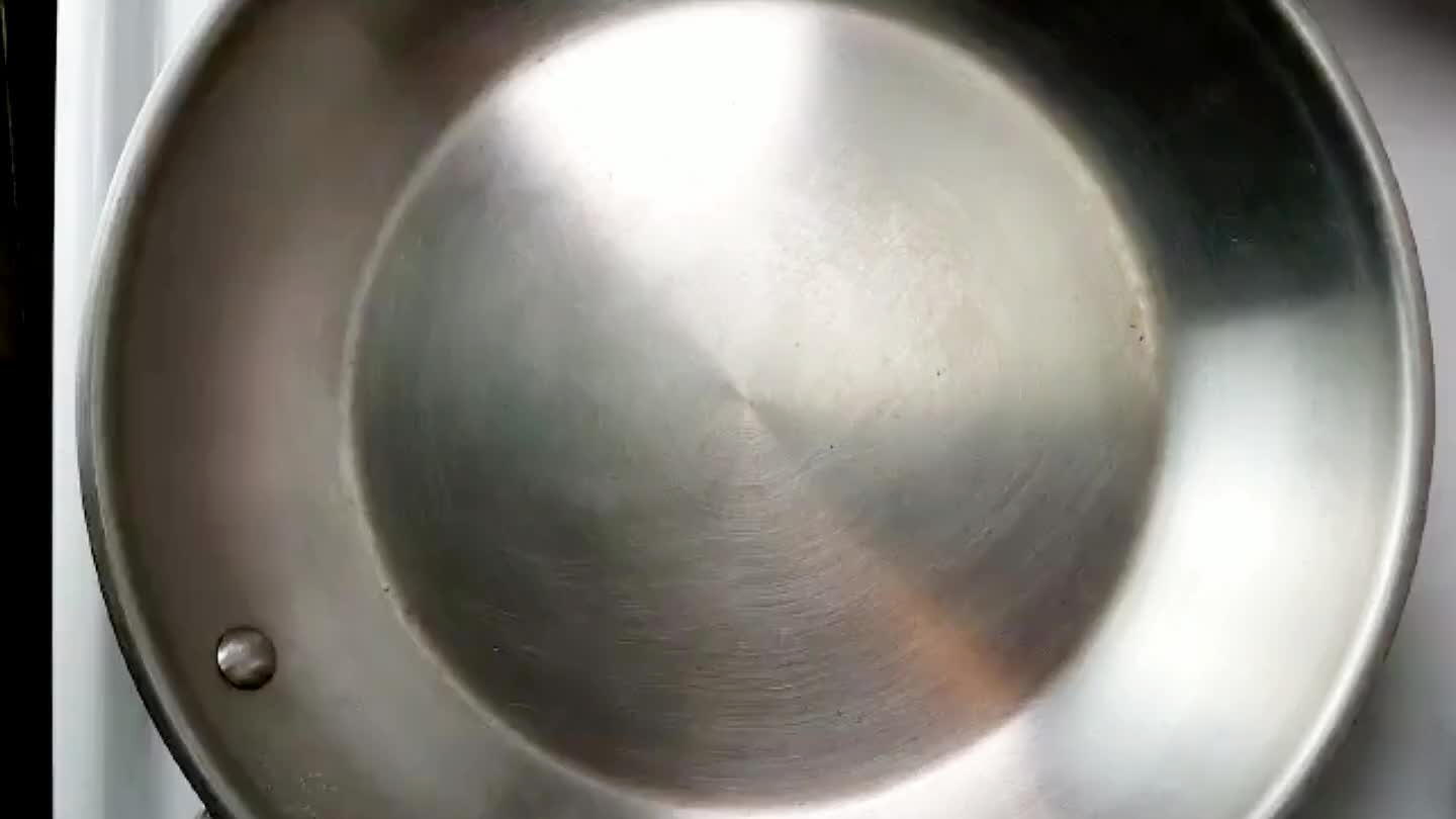 Warm milk in a steel pan over medium-low heat.