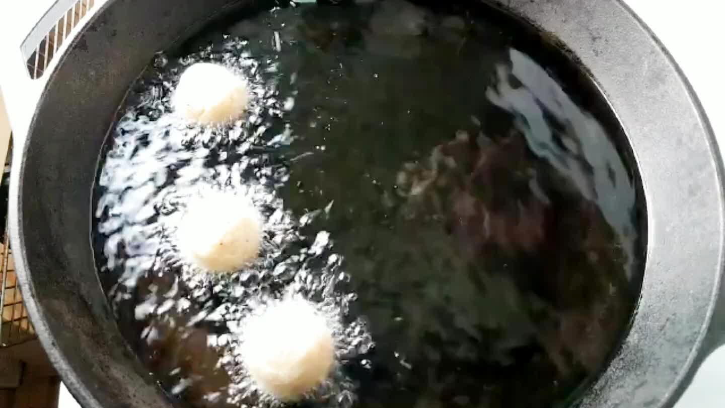 As you add gulab jamun to the pan, the oil temperature will drop. Increase the heat carefully to maintain a temperature above 325ºF (170ºC).