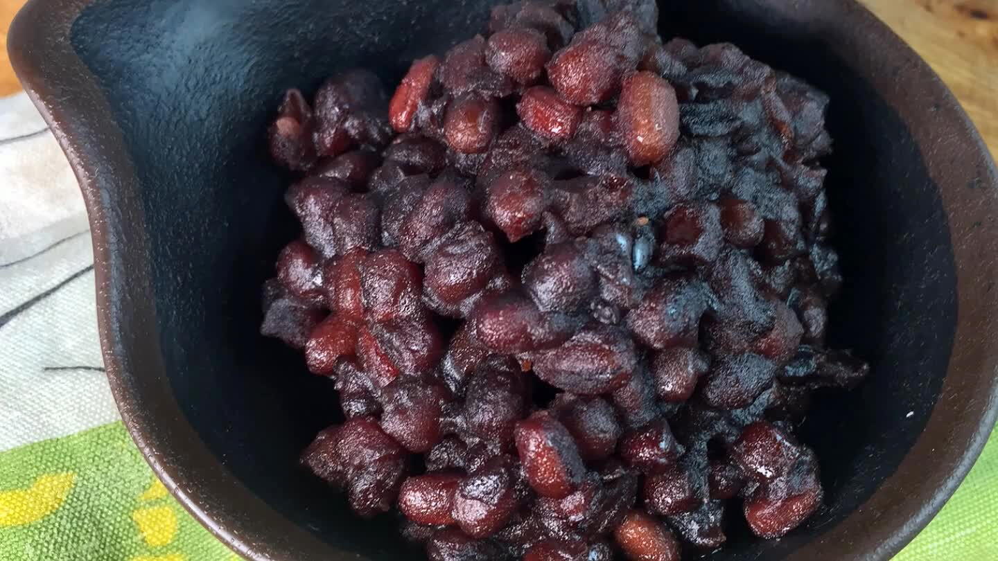 them carefully to maintain proper texture. When the beans are cooked, sugar is added and the mixture is reduced to a syrup consistency. Follow the attached recipe.
