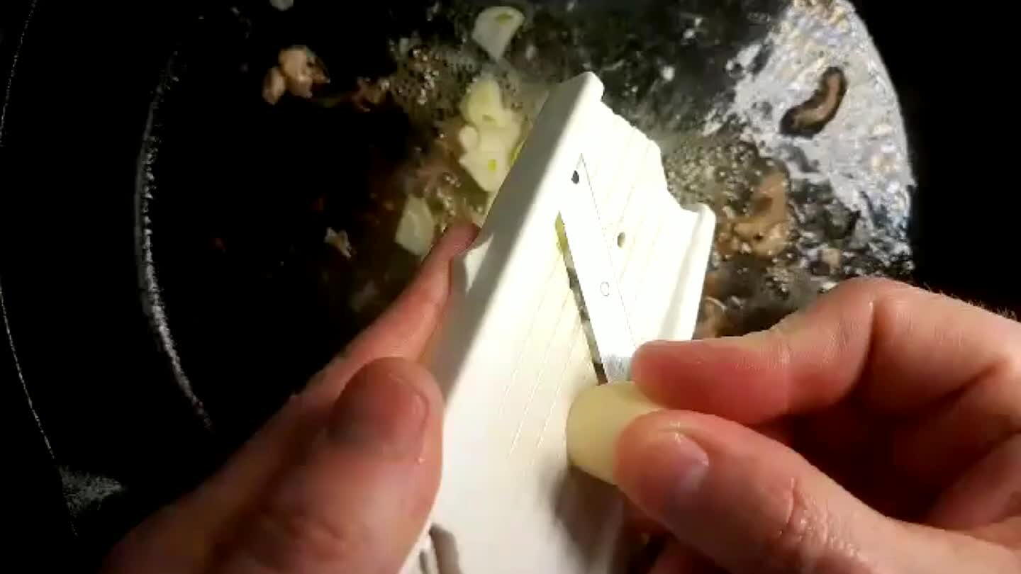 oline slicer I use and I find it quite easy to slice garlic as needed.