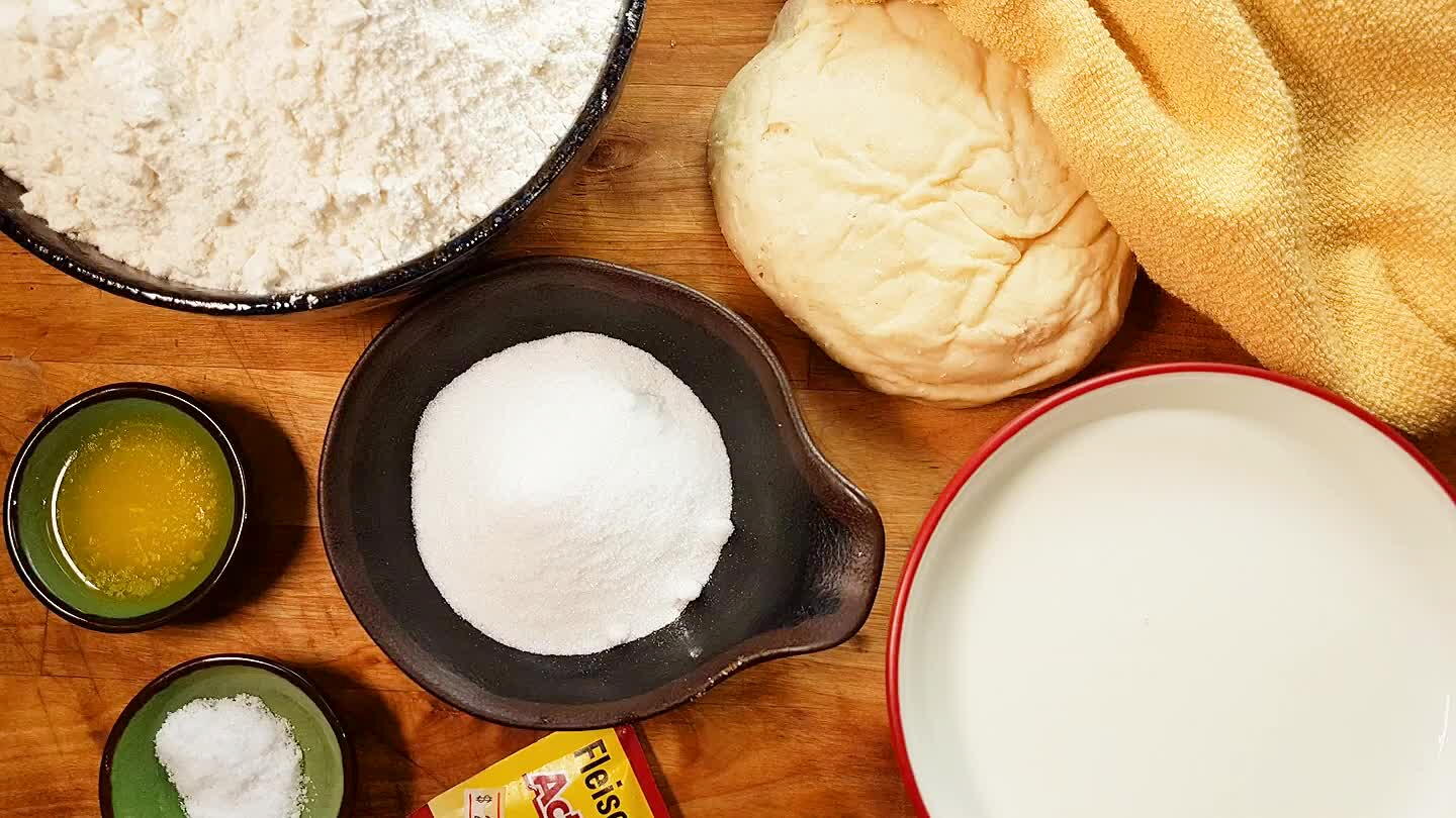 need your preferment, 1 packet of yeast, 14 oz milk, 28oz. flour, 2.5 oz sugar, 1 tsp of salt and 1 tbsp of melted butter.
