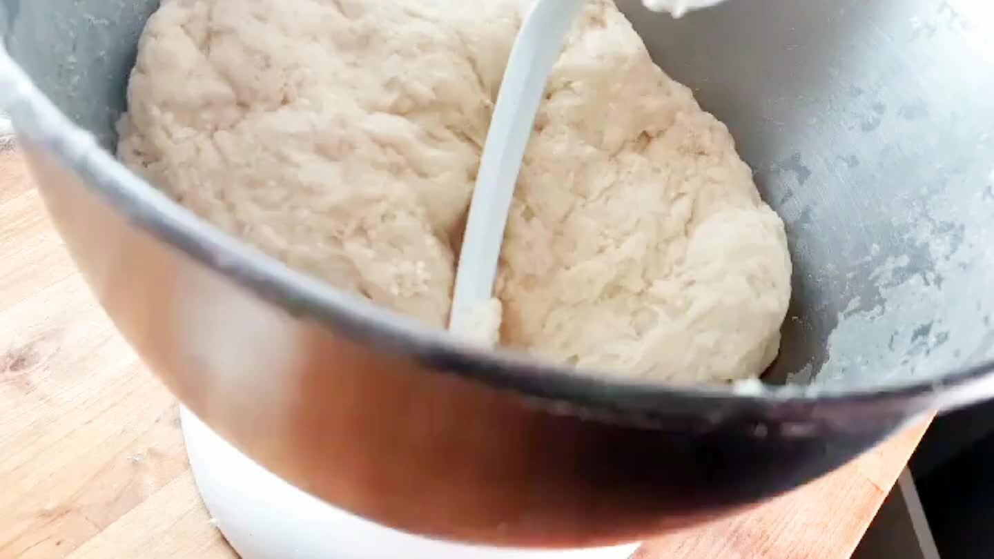 ould be more elastic now. Mix it for another 4 minutes or so with the hook on low. My kitchenaid was really struggling at this point so I actually had to knead it manually.
