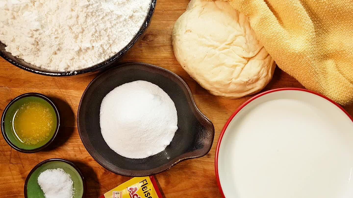 need your preferment, 1 packet of yeast, 14 oz milk, 28oz. flour, 2.5 oz sugar, 1 tsp of salt and 1 tbsp of melted butter.