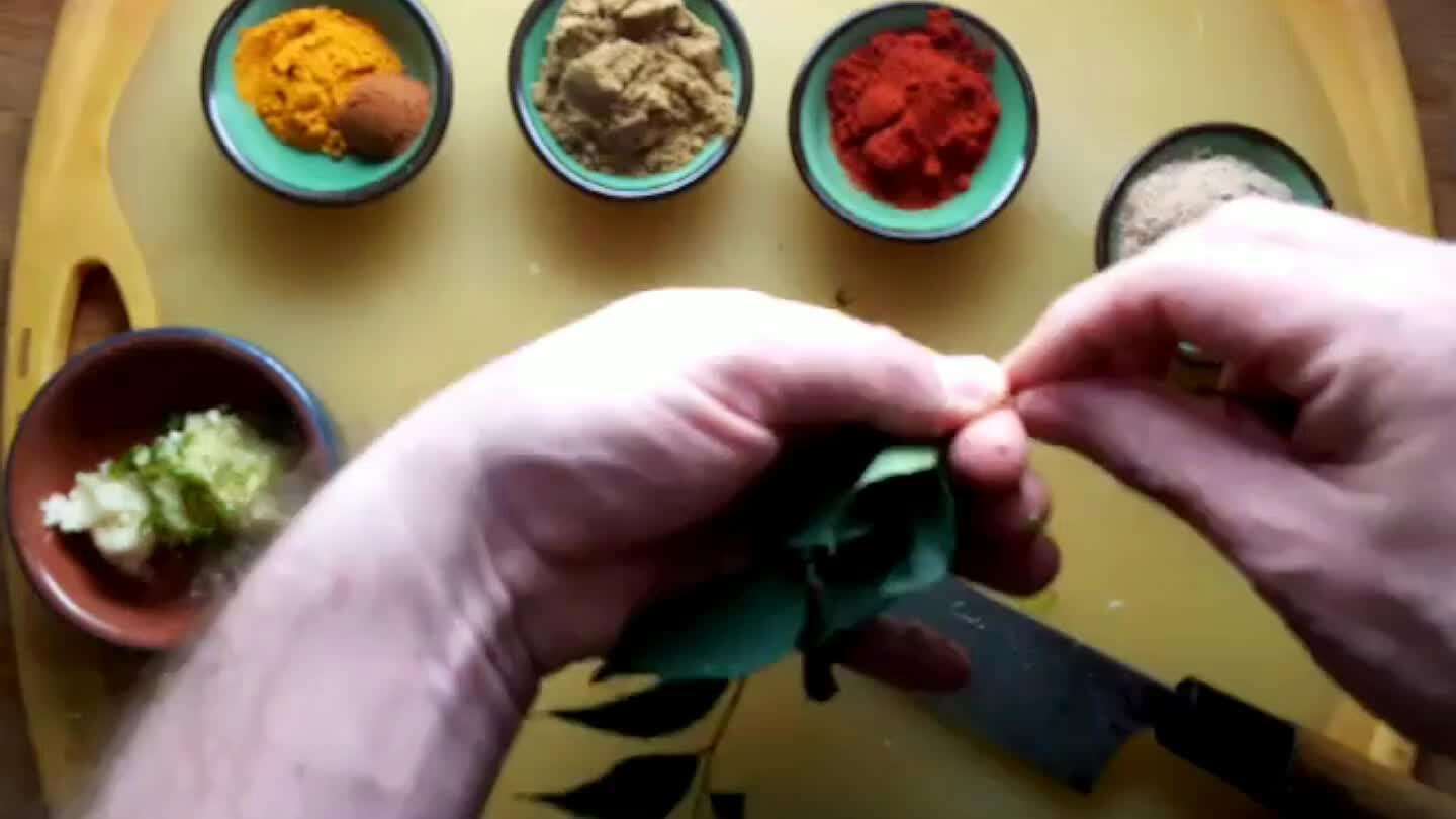 e first time. Crush the garlic. Grate the ginger. Measure out the spices. Pick the curry leaves and chop them up.