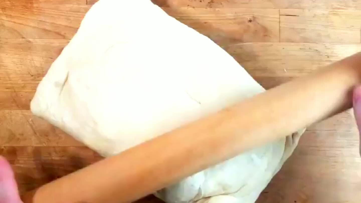 haw. When the dough is at a workable texture, roll it out to a large rectangle. I like to shoot for somewhere around 1/4"-1/2" thick. The rectangle should be around 25"x10".