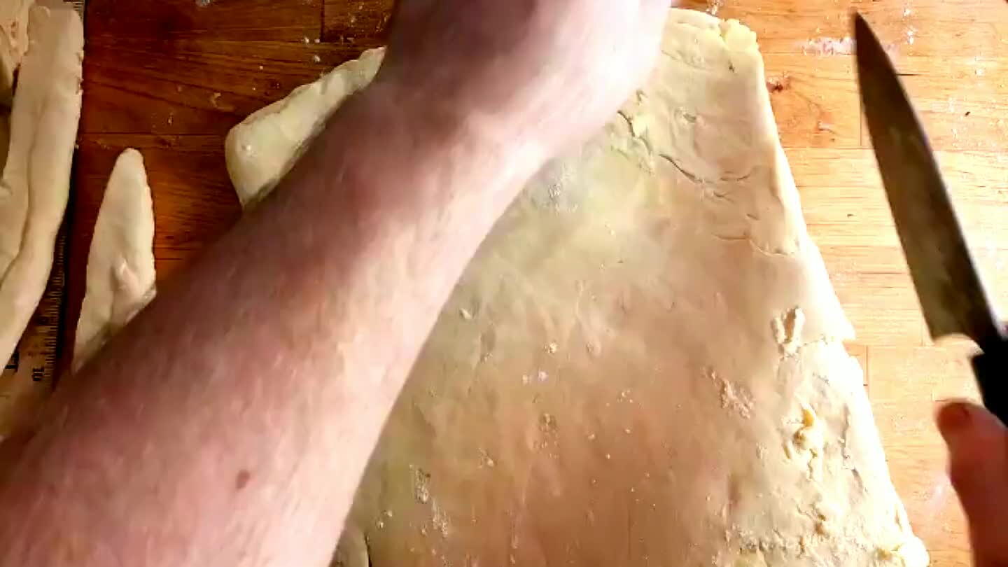 With a sharp knife, slice off some scraps from the edge. You can cook these scraps for chef snacks if you like.