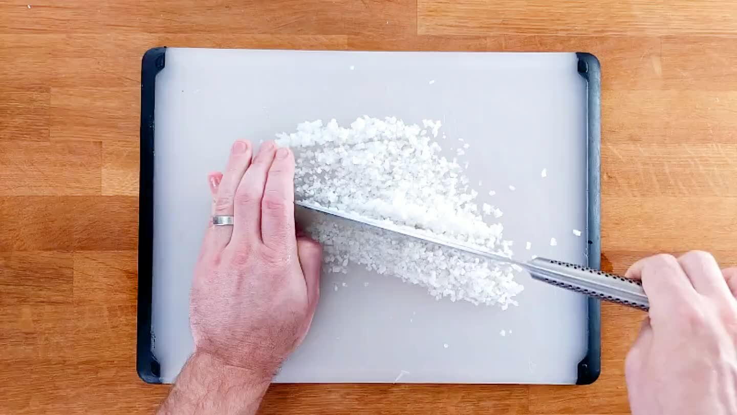Chop the onion as finely as possible.