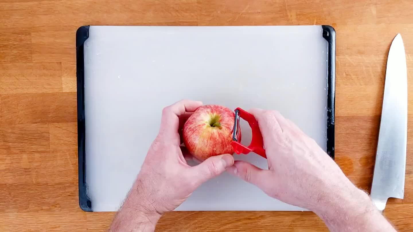 Peel the apples and cut them in half through the stem and core.