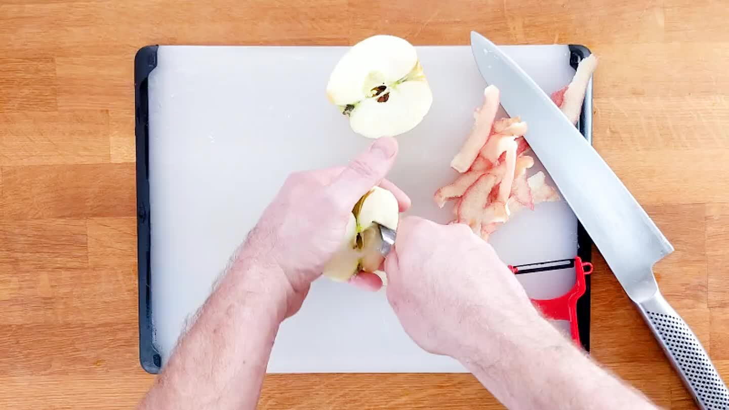 Remove the core. A small spoon is perfect for this task, just scoop around the seeds. Slice out the stem.