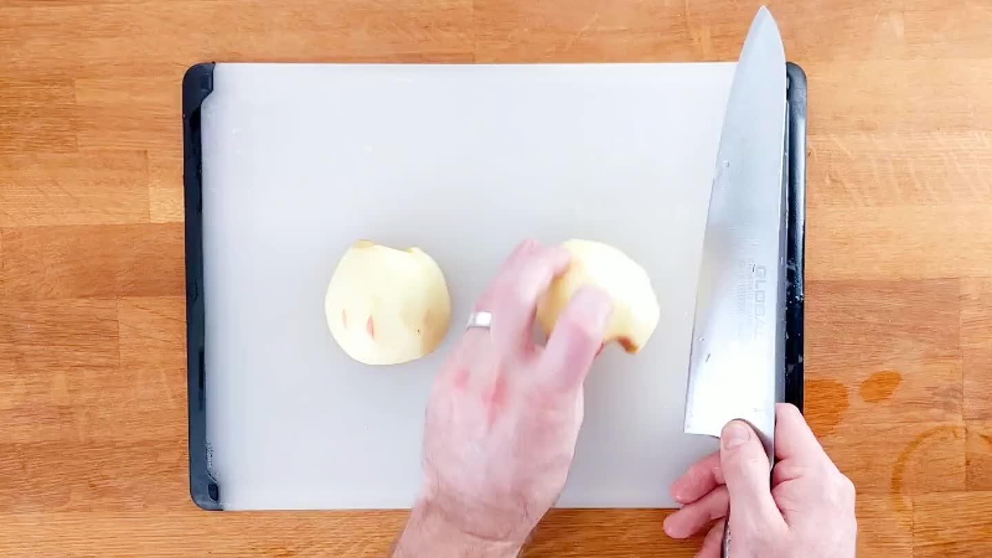 Slice into wedges, then arrange the wedges and cut in the opposite direction to dice.