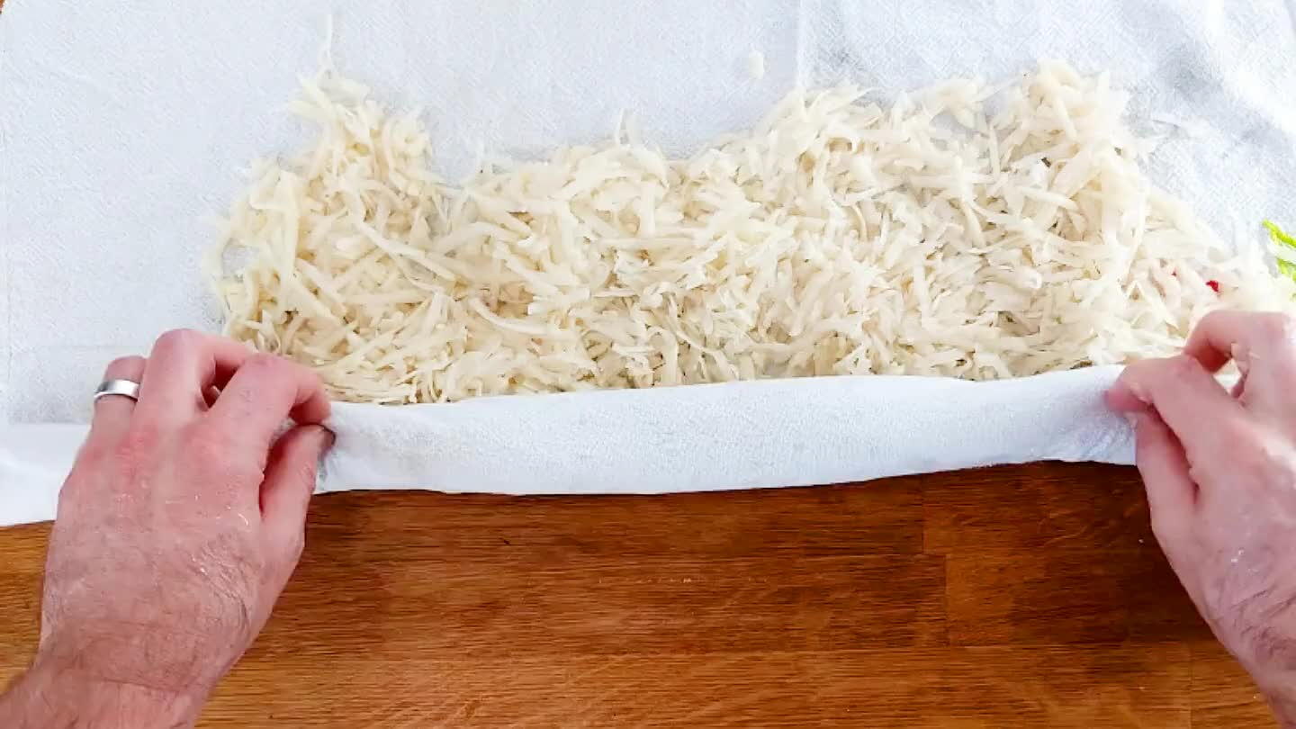 e towel tightly to strain off water.