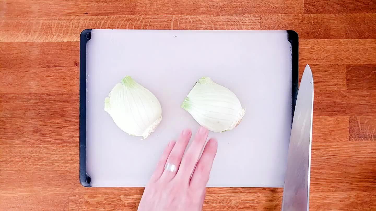 the bulb, it has a generally ovular shape. Slice through this oval at it's widest point.