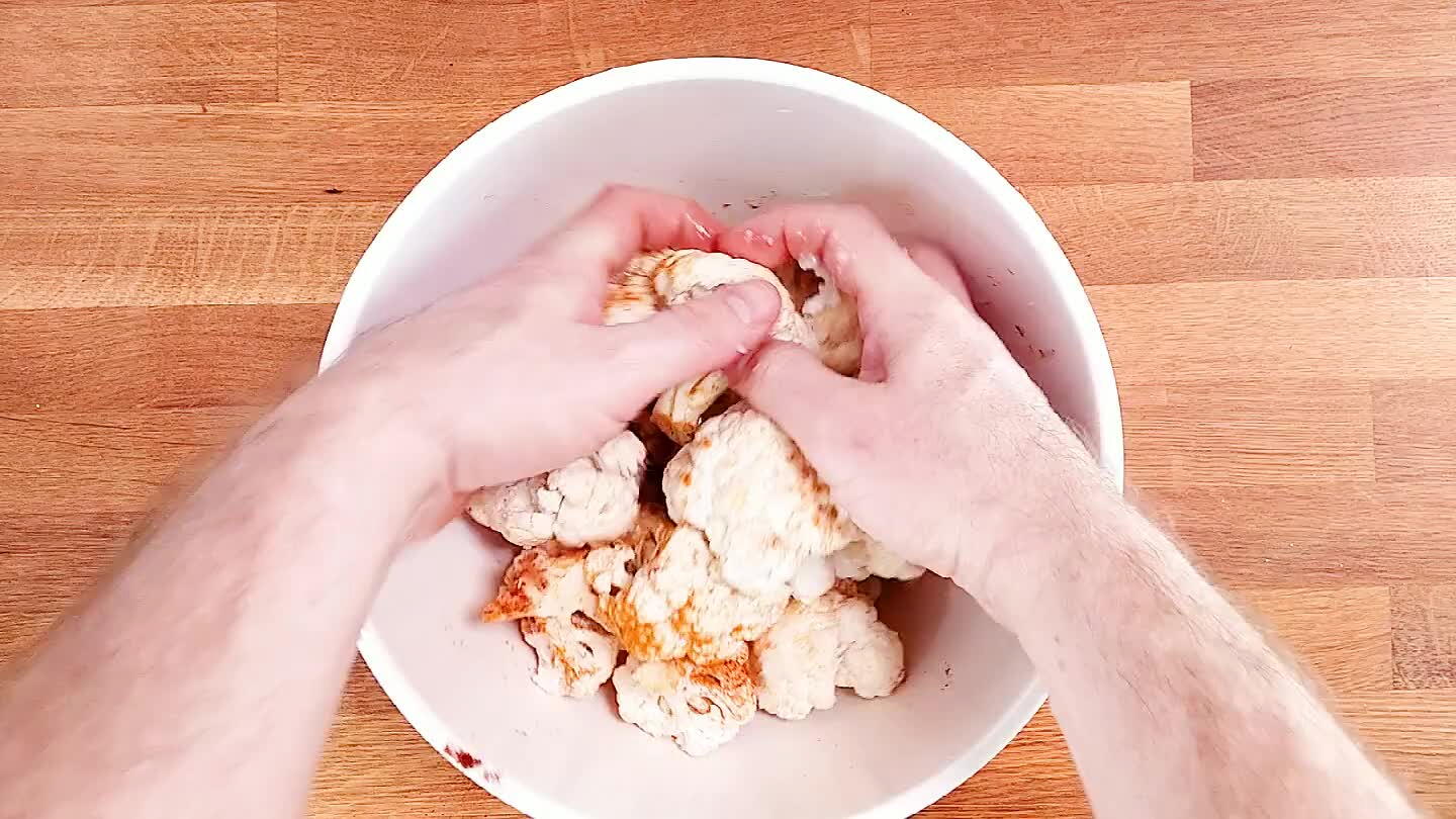 Toss to mix and coat the cauliflower evenly.