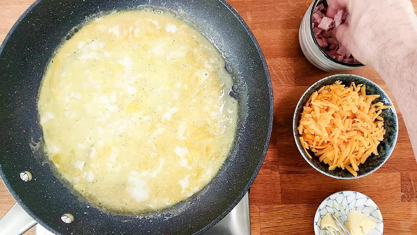 ingredients in a line coming from the handle of the pan. This will make rolling a little easier.
