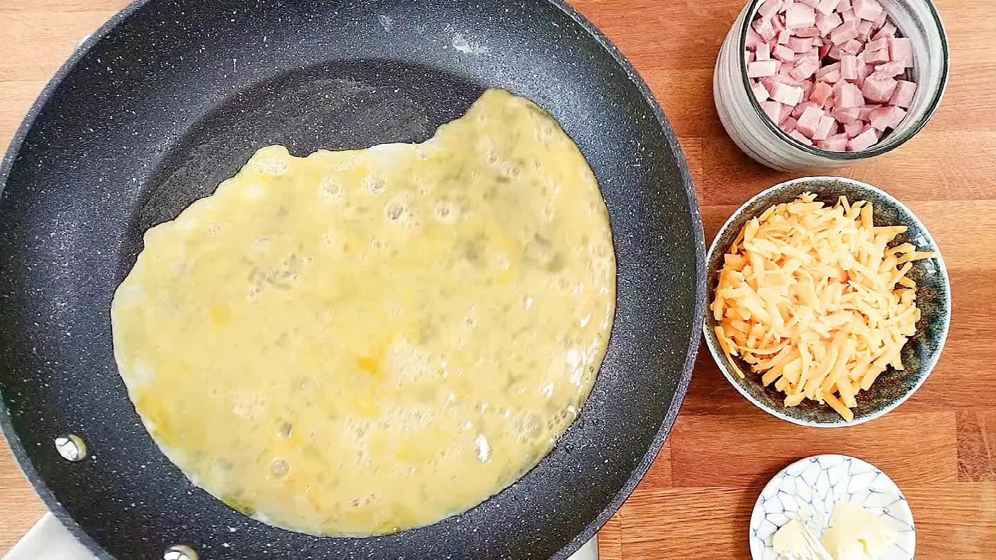 h without browning. If the bottom is cooking too fast, you can lift it gently with a fork and let some of the uncooked egg run underneath.