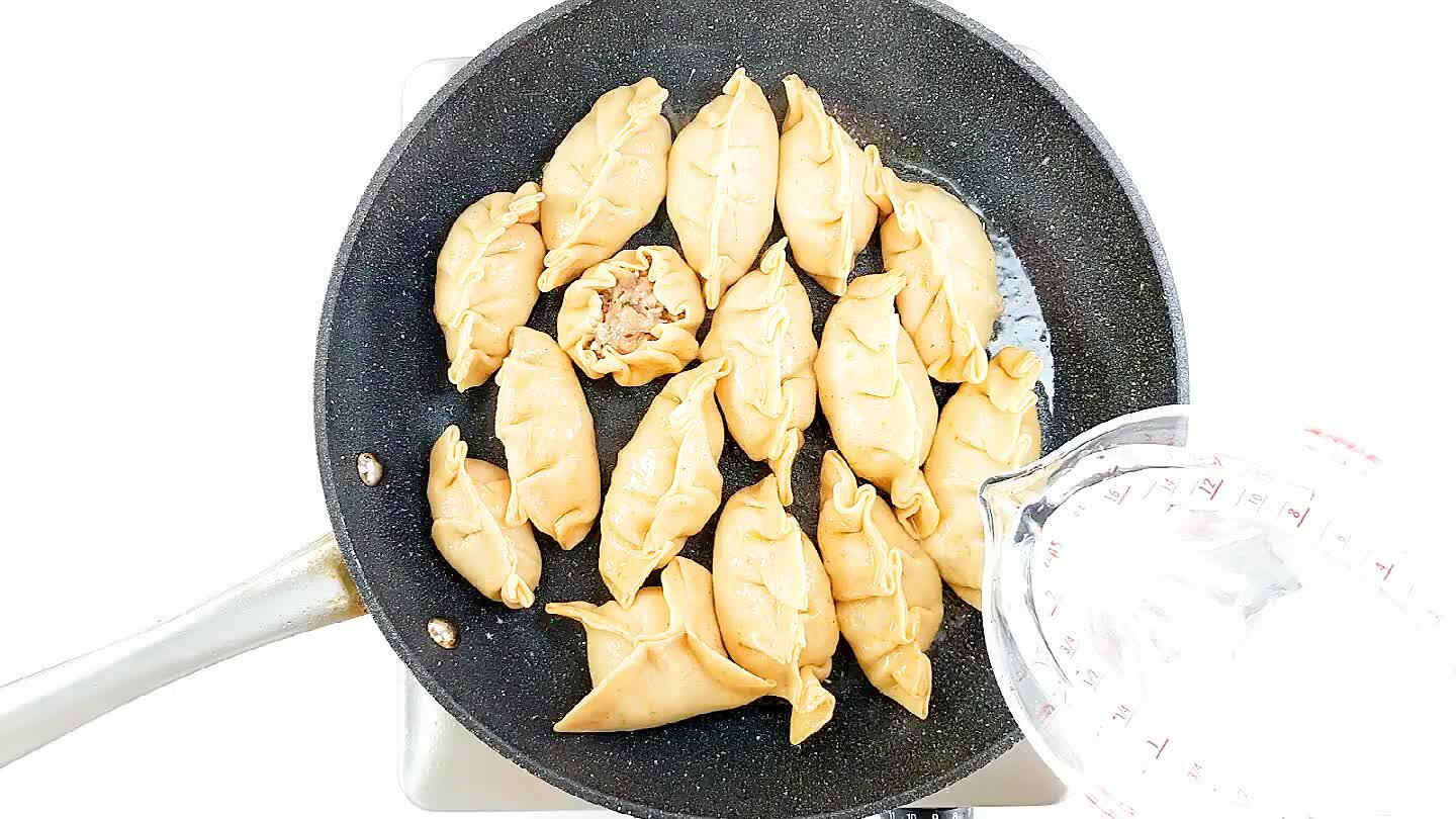 nt, but keep in mind that adding water to very hot oil can be disastrous. Cover the pan and steam the dumplings for about 5 minutes.