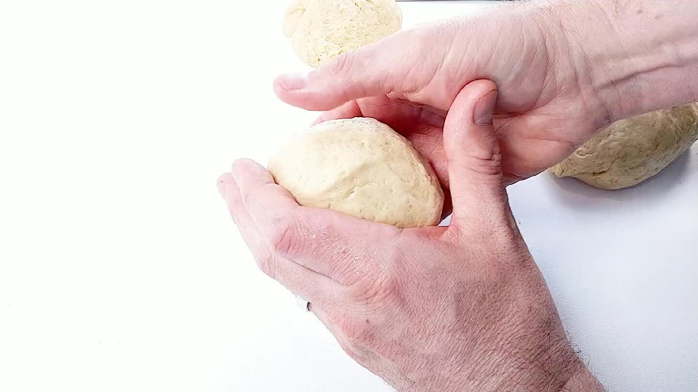 he dough around on itself and pinch closed in the back.