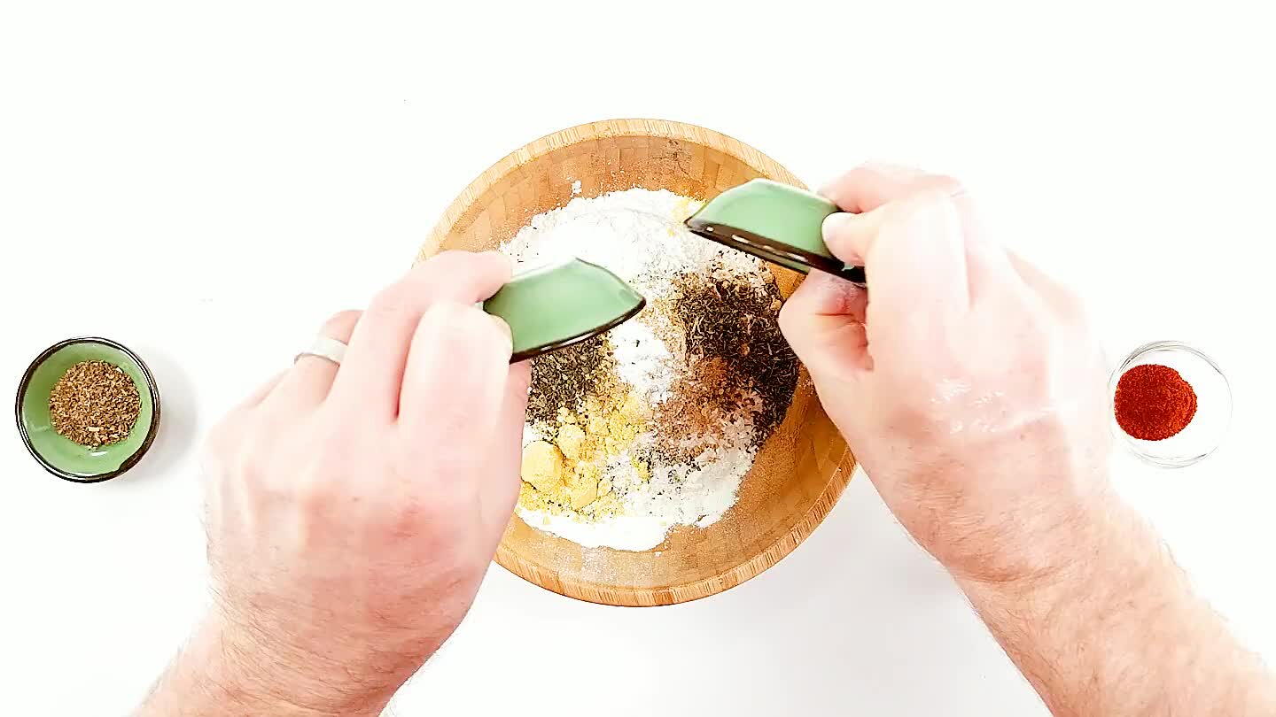 Toss the flour and all of the spices in a mixing bowl and stir.
