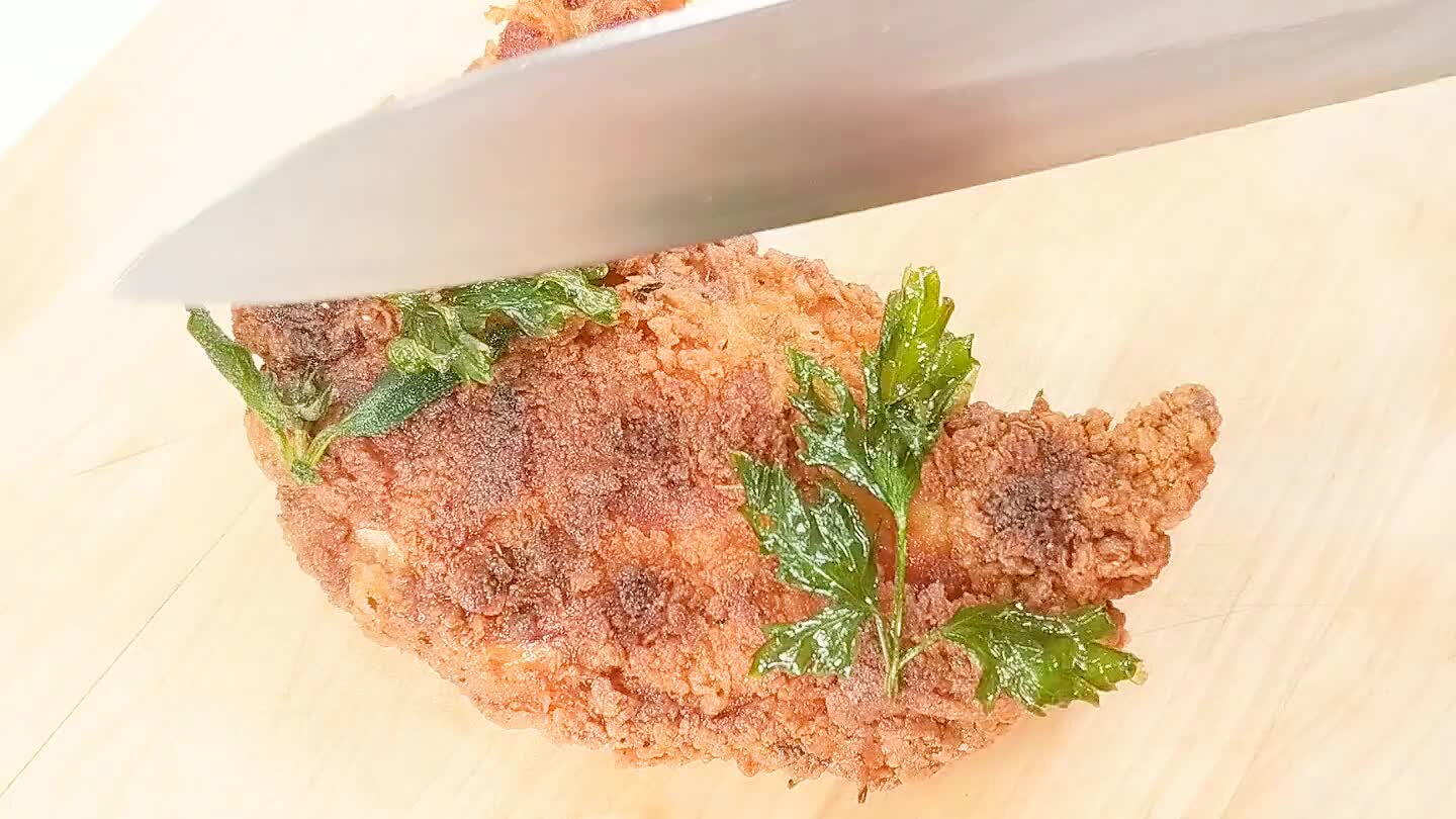 Serve with fried herbs and lemon slices.