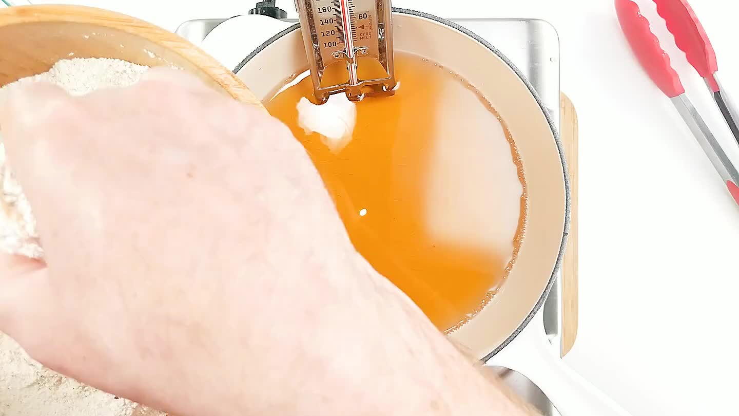 pots are visible. You can even squeeze the coating tight to the chicken to help it stay strong through frying.