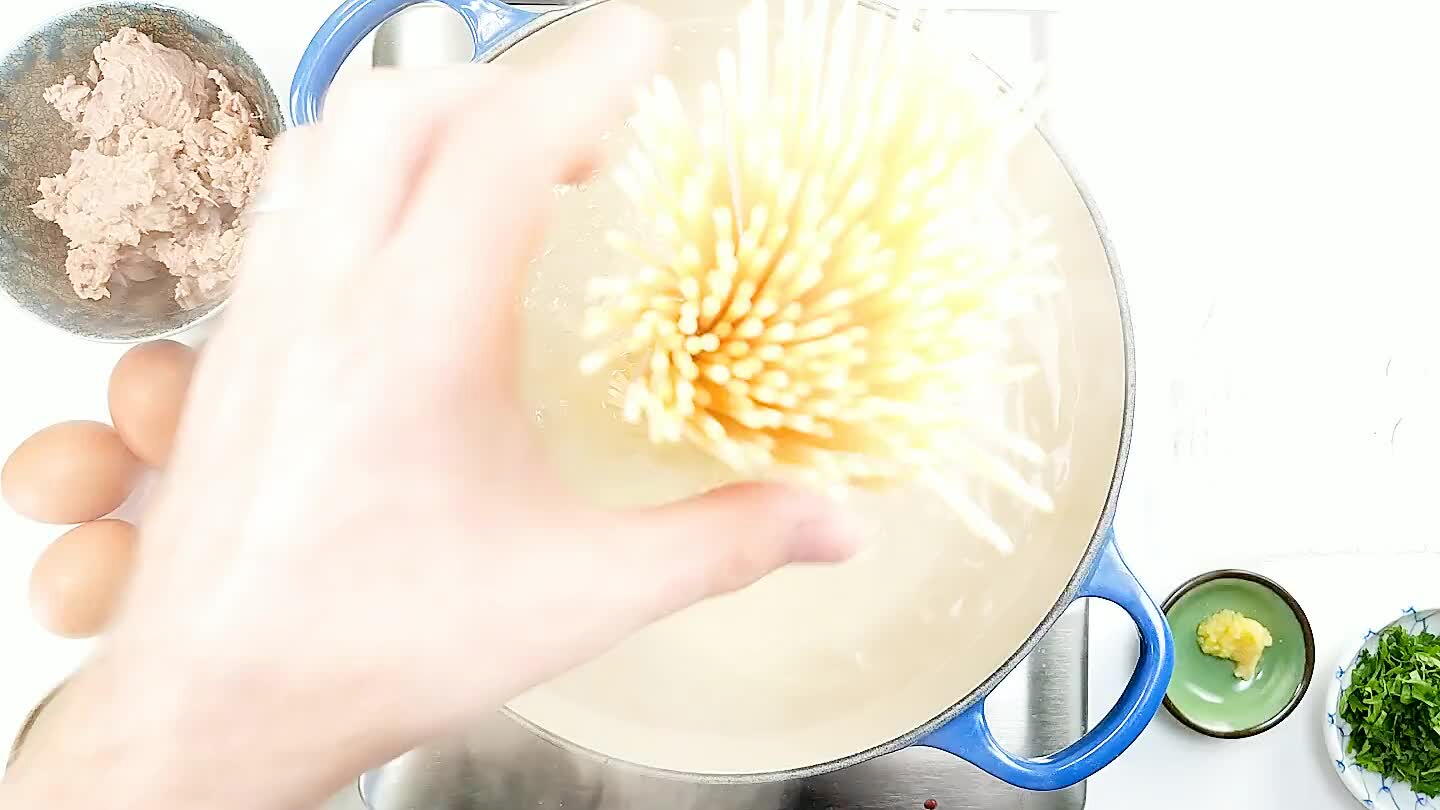 er you drop the spaghetti to make sure it doesn't stick together.