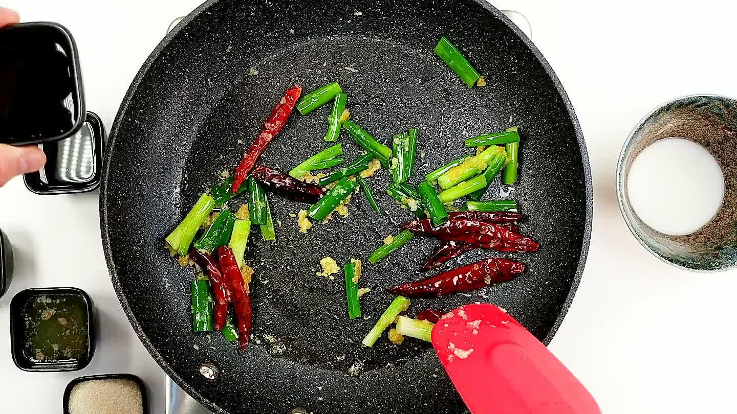 ing to a simmer to pick up the chili flavor and thicken the sauce slightly.