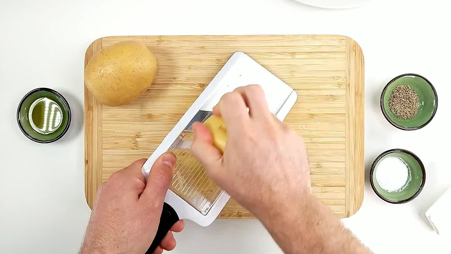 tly thin slices. Slice a potato almost thin enough to be transparent. It may take a little experimenting to find a thickness you like.