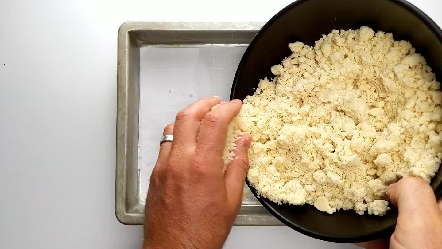 n an even layer. I like to line the bottom of the pan with a little parchment to avoid sticking, but there's enough butter in this stuff that it shouldn't be necessary.