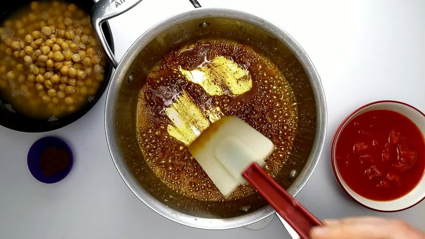 from getting stuck to the bottom of the pan. Give the spices, garlic and ginger a few seconds to toast before moving onto the next step.